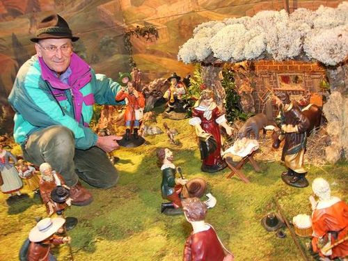 Setup and visiting of traditional landscape nativity scenes in the Salzkammergut region